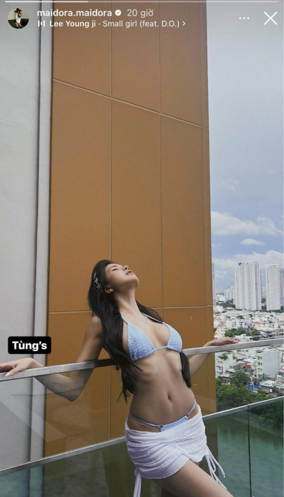 Mai Dora phơi nắng khoe đường cong đắt giá, không quên làm một điều- Ảnh 1.