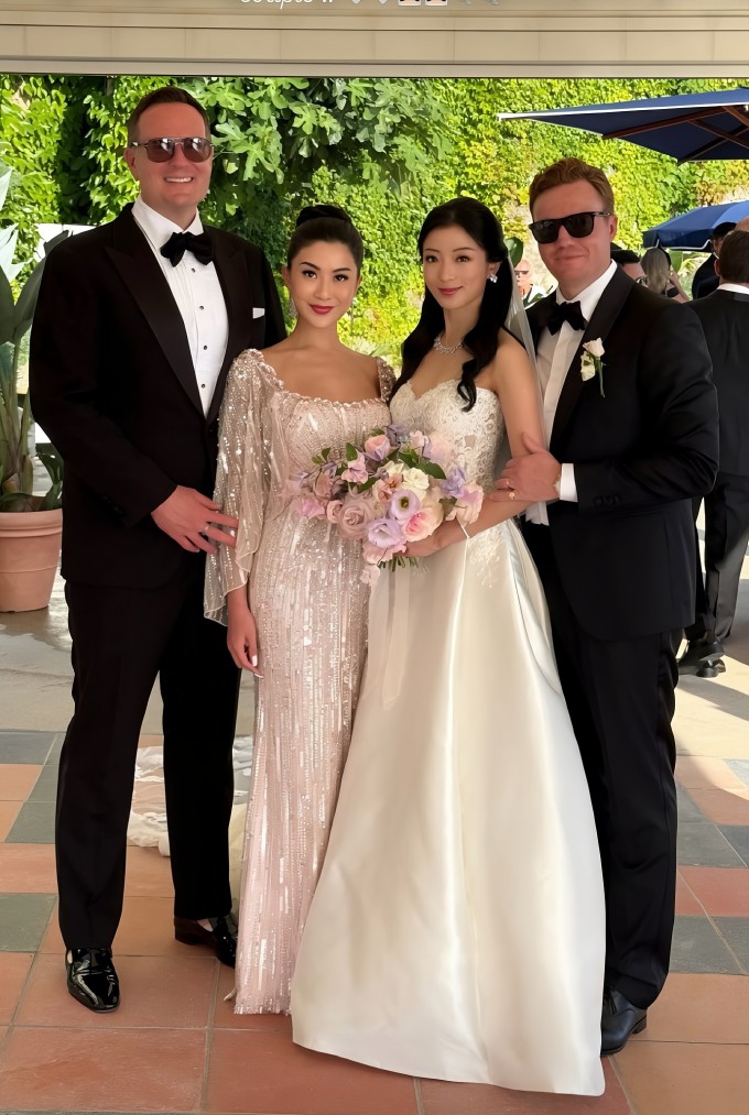 1749539743-1q-9332-9342-6631-0797-width680height1013 Vợ chồng Trần Khả Hân (phải) trong ngày cưới. Ảnh: Instagram