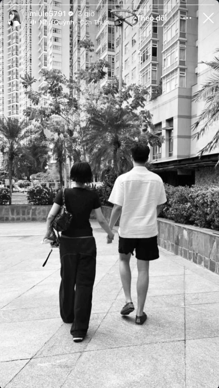 Miu Lê chia sẻ hình ảnh cặp đôi nắm tay cực tình tứ trên trang cá nhân.