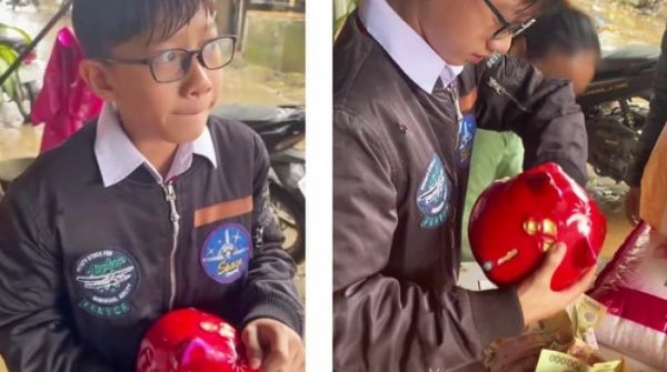 Xúc động hình ảnh cậu bé bẽn lẽn ôm heo đất đến ủng hộ bà con vùng lũ 1764034185 503 thumbnail width740height495 anh cat 3 2 auto cropjpg