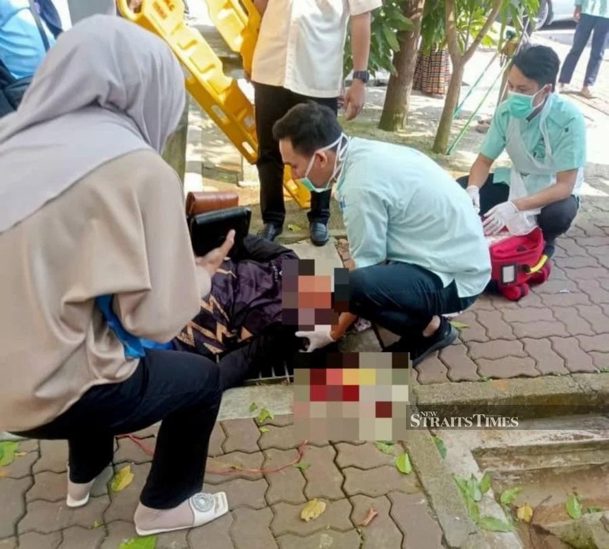 Đang đi trên đường, người phụ nữ bị xe đạp từ tầng 12 rơi trúng đầu- Ảnh 1.