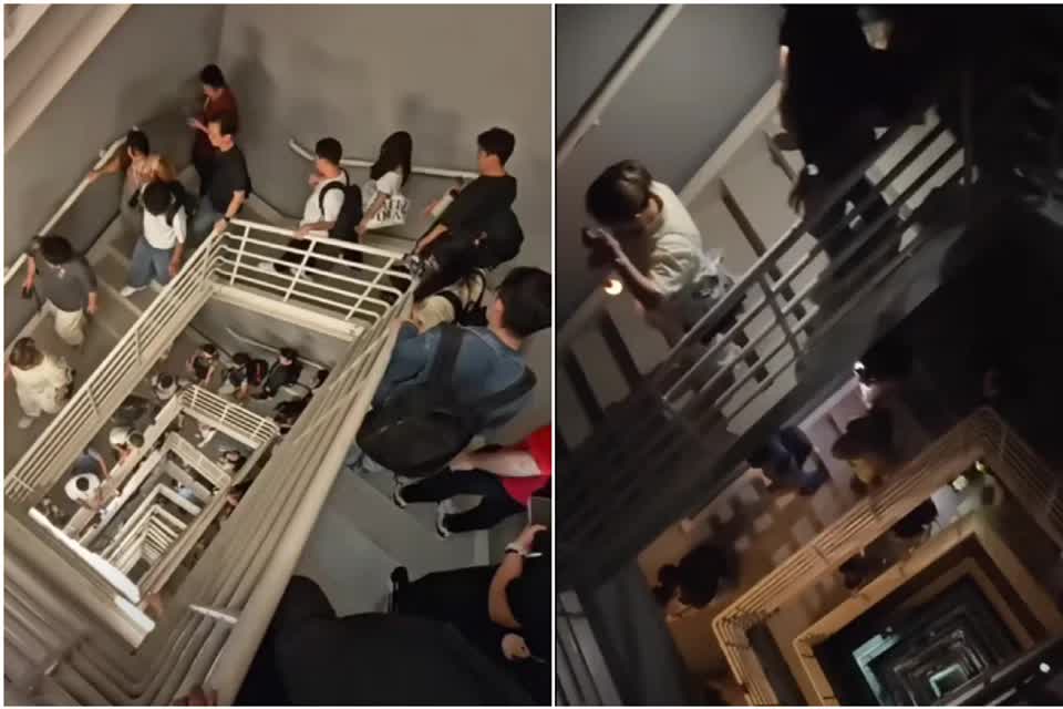 Nhân viên tan làm phải đi bộ 106 tầng vì thang máy hỏng- Ảnh 1.