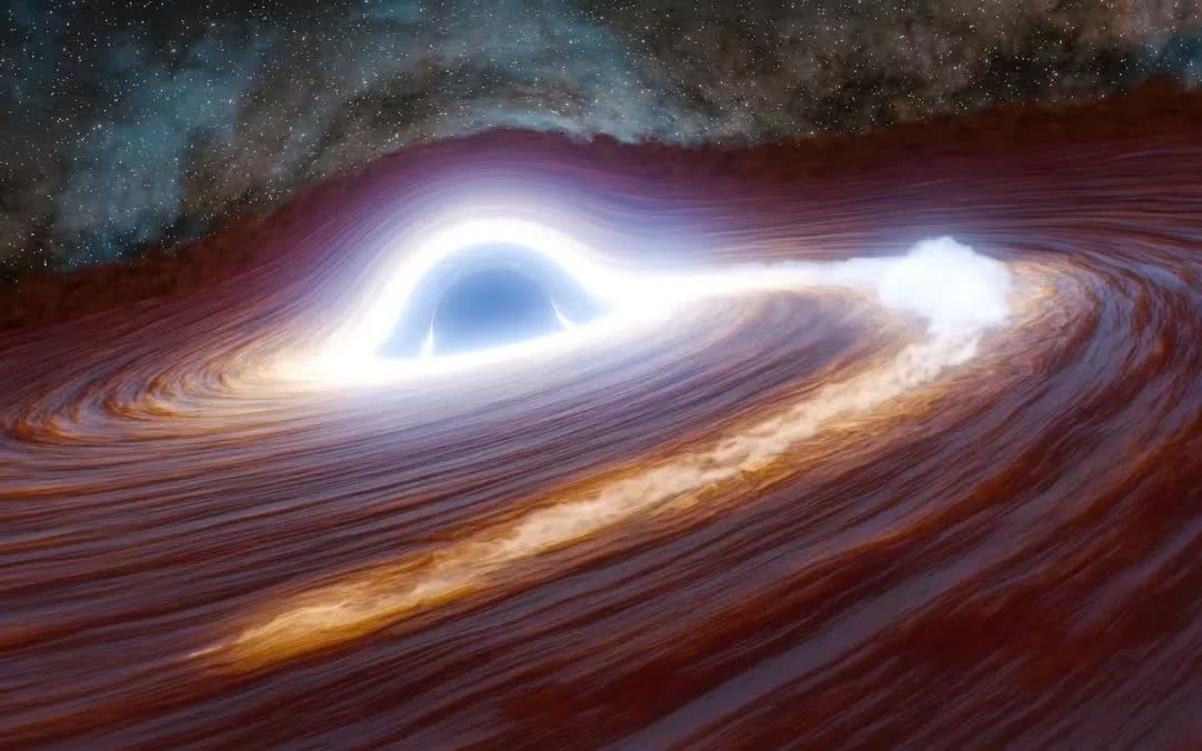 Hình minh họa mô phỏng lỗ đen siêu lớn đang xé toạc một ngôi sao có khối lượng gấp 30 lần Mặt Trời (Ảnh: Caltech)