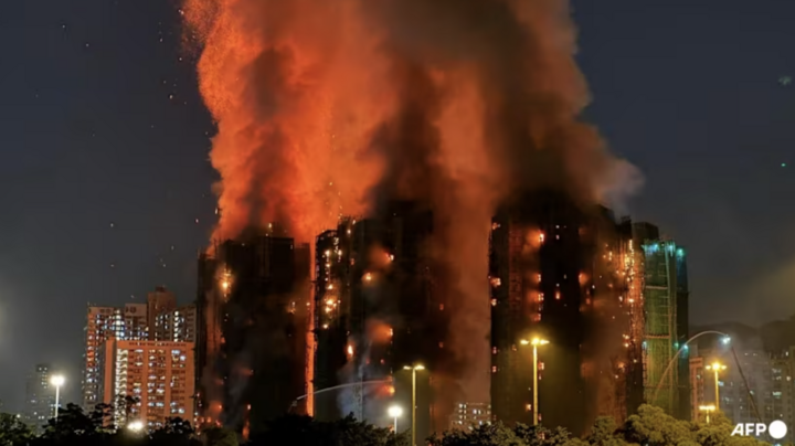 Hình ảnh tang thương vụ cháy ở Hong Kong khiến ít nhất 13 người thiệt mạng- Ảnh 4.