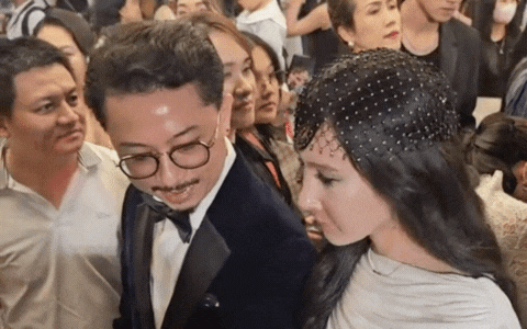 Tranh cãi chồng Lâm Vỹ Dạ để gái lạ khoác tay trên thảm đỏ- Ảnh 1.