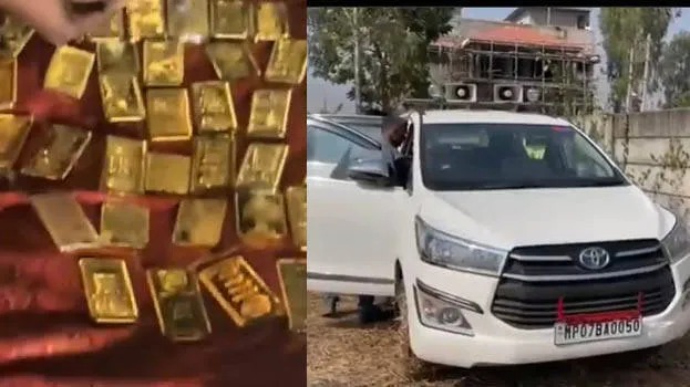 Phát hiện 52 kg vàng ròng và 30 tỷ đồng trên chiếc xe Toyota Innova- Ảnh 1.