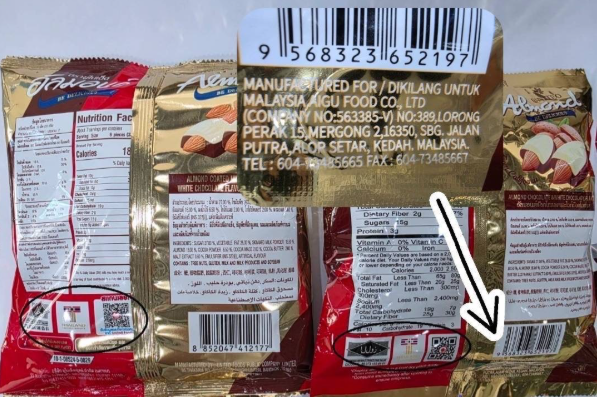 Đột kích một cửa hàng trong trung tâm thương mại, cảnh sát triệt phá đường dây sản xuất đồ ăn vặt giả do người Trung Quốc cầm đầu, hơn 27.000 sản phẩm bị thu giữ- Ảnh 3.