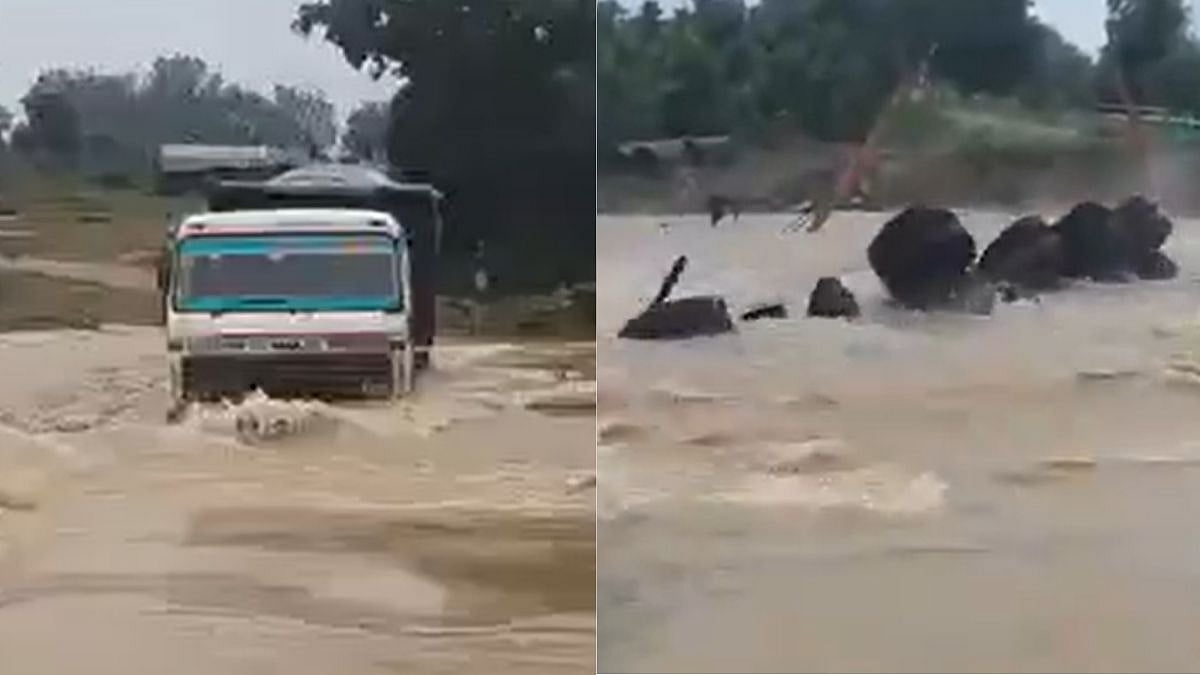 Tài xế xe tải mất tích khi cố lái xe vượt qua dòng nước lũ- Ảnh 1.