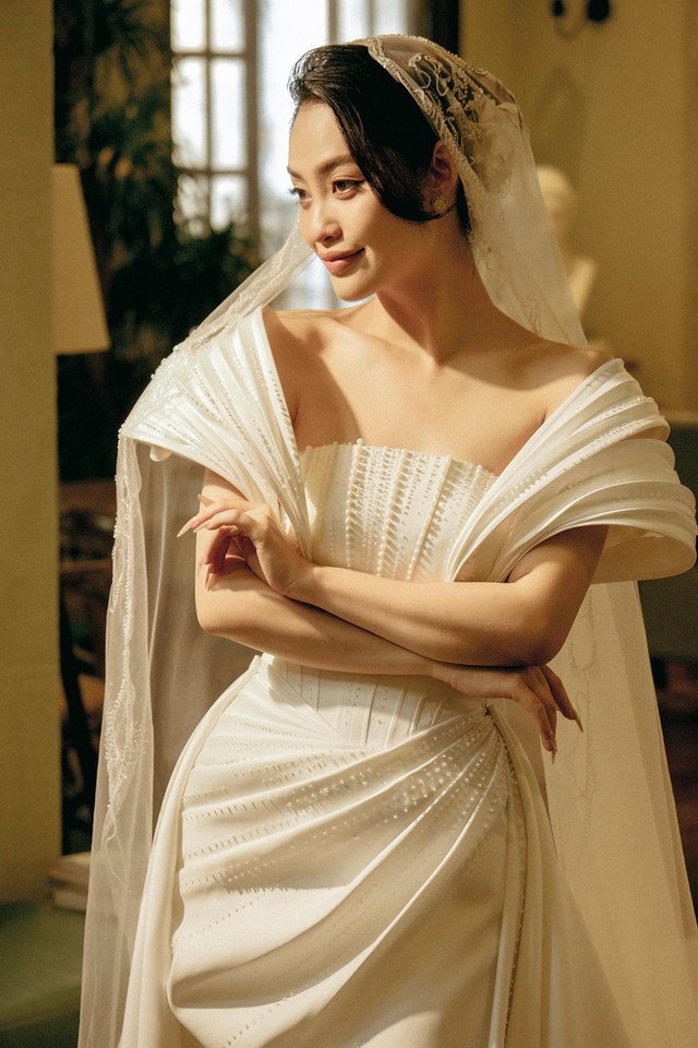Hoa hậu 99 tung ảnh mặc váy cưới lộng lẫy giữa lúc vướng tin kết hôn với bạn trai Phó giám đốc- Ảnh 5.
