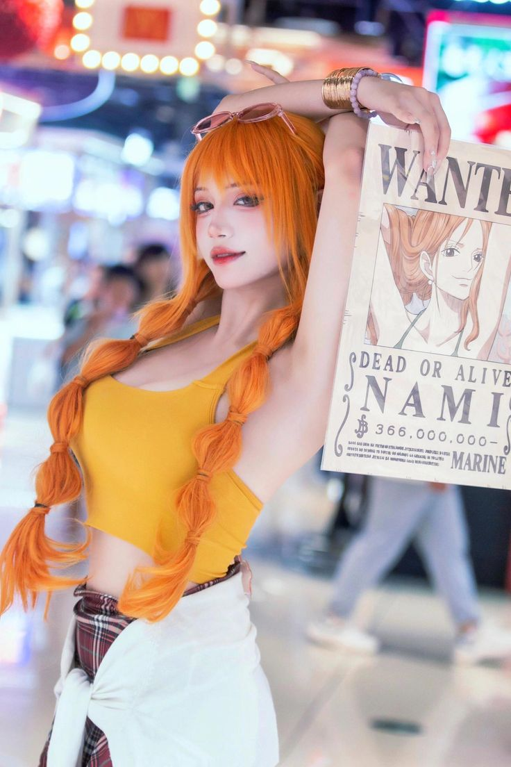 Cosplay Nami, khi nữ thần One Piece bước ra đời thực xuất thần đến từng milimet- Ảnh 3. Cosplay Nami, khi nữ thần One Piece bước ra đời thực xuất thần đến từng milimet- Ảnh 3.