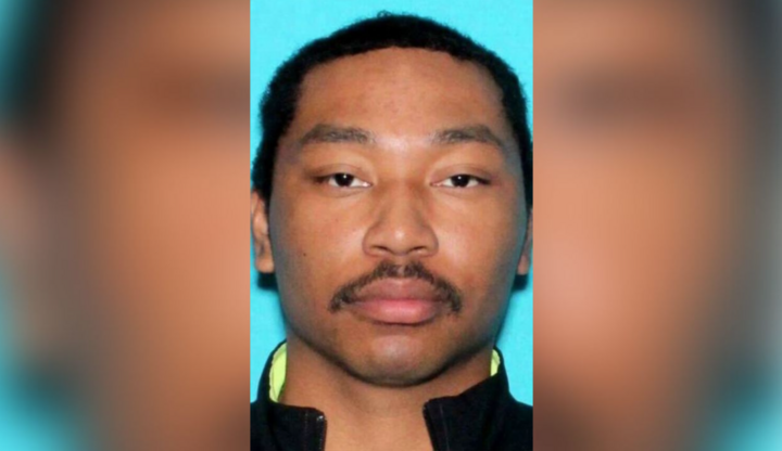 Sát thủ mặc vest mang súng trường M4, bắn hạ cảnh sát Mỹ ngay sảnh toà nhà- Ảnh 1.