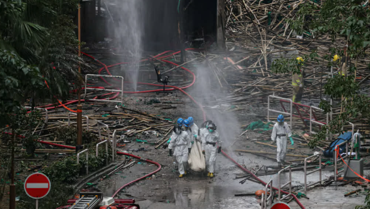 Ám ảnh hiện trường cháy chung cư Hong Kong: Tài sản thành tro, thi thể biến dạng- Ảnh 3.