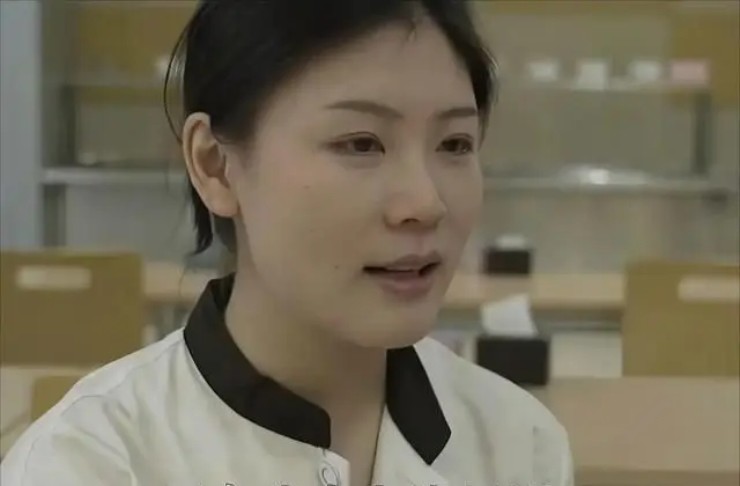 Huang rất hạnh phúc với lựa chọn trở thành nhân viên căng tin của mình