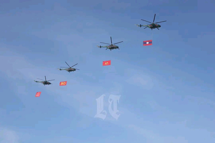 Mãn nhãn màn trình diễn của không quân Lào trong lễ kỷ niệm 50 năm Quốc khánh- Ảnh 9.