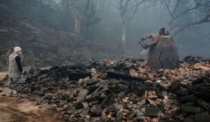 Khung cảnh hoang tàn tại Hàn Quốc sau một tuần đám cháy rừng bùng phát- Ảnh 3.