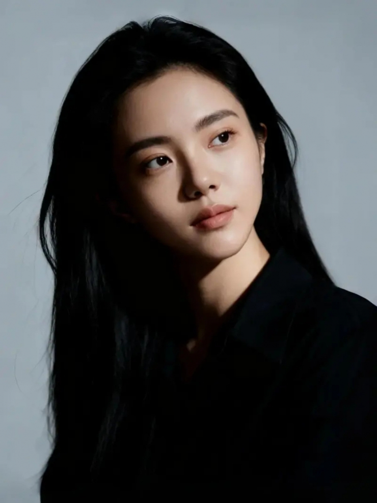  Nữ ca sĩ Lương Hiểu Quân.