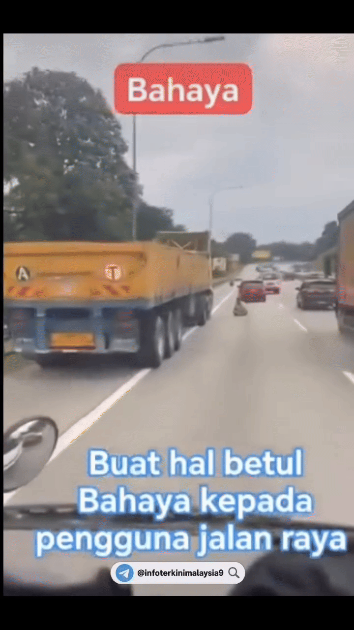 Tài xế xe tải dừng xe ở lề đường, ngồi khoanh chân làm 1 việc khiến ai đi qua cũng lắc đầu khó hiểu- Ảnh 1.