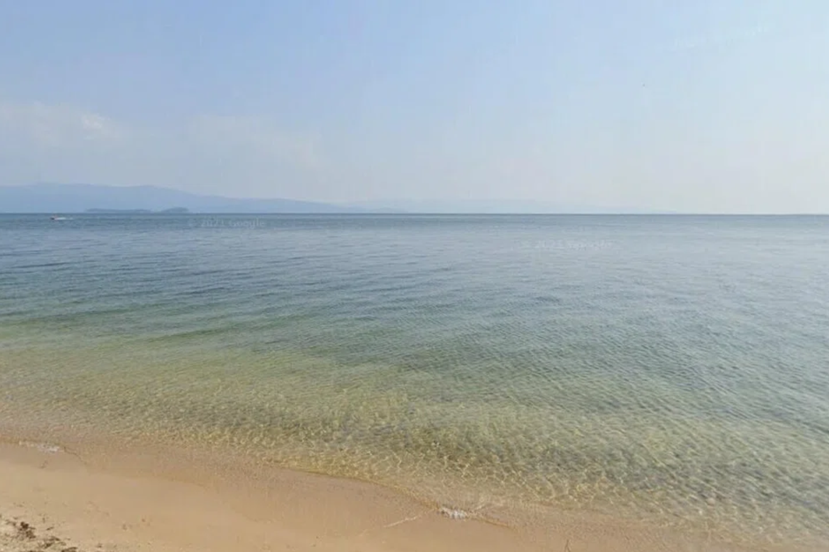 Xe du lịch rơi xuyên qua lớp băng trên hồ Baikal (Nga), 7 người Trung Quốc thiệt mạng- Ảnh 2.