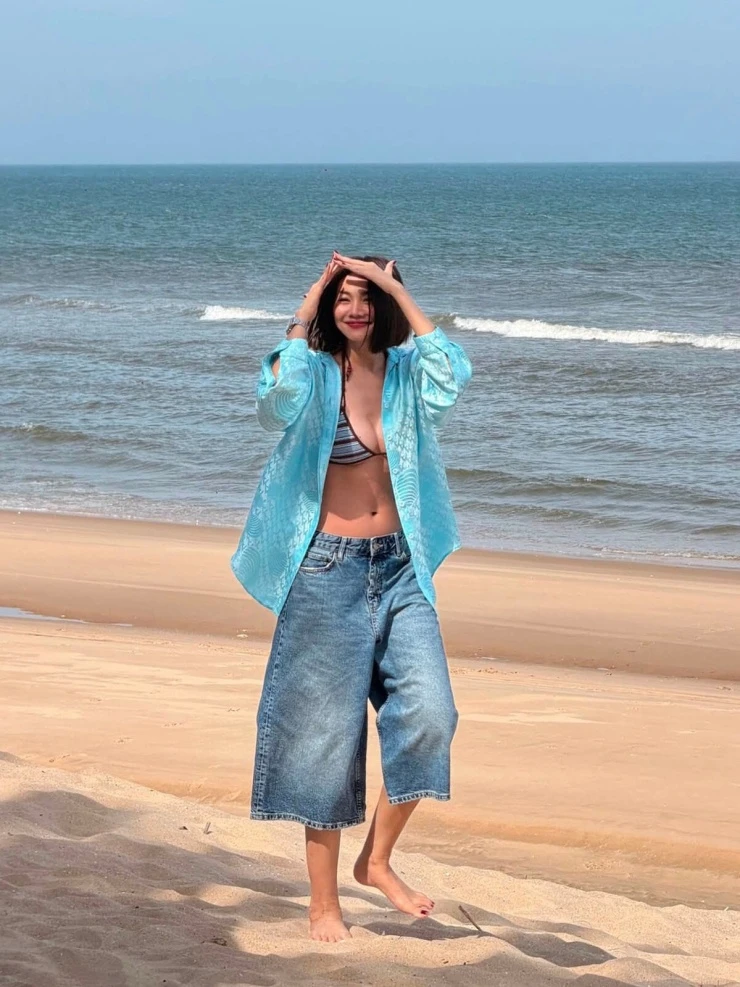 Ảnh sao 25/7: Phương Oanh trẹo lưng vì bế con